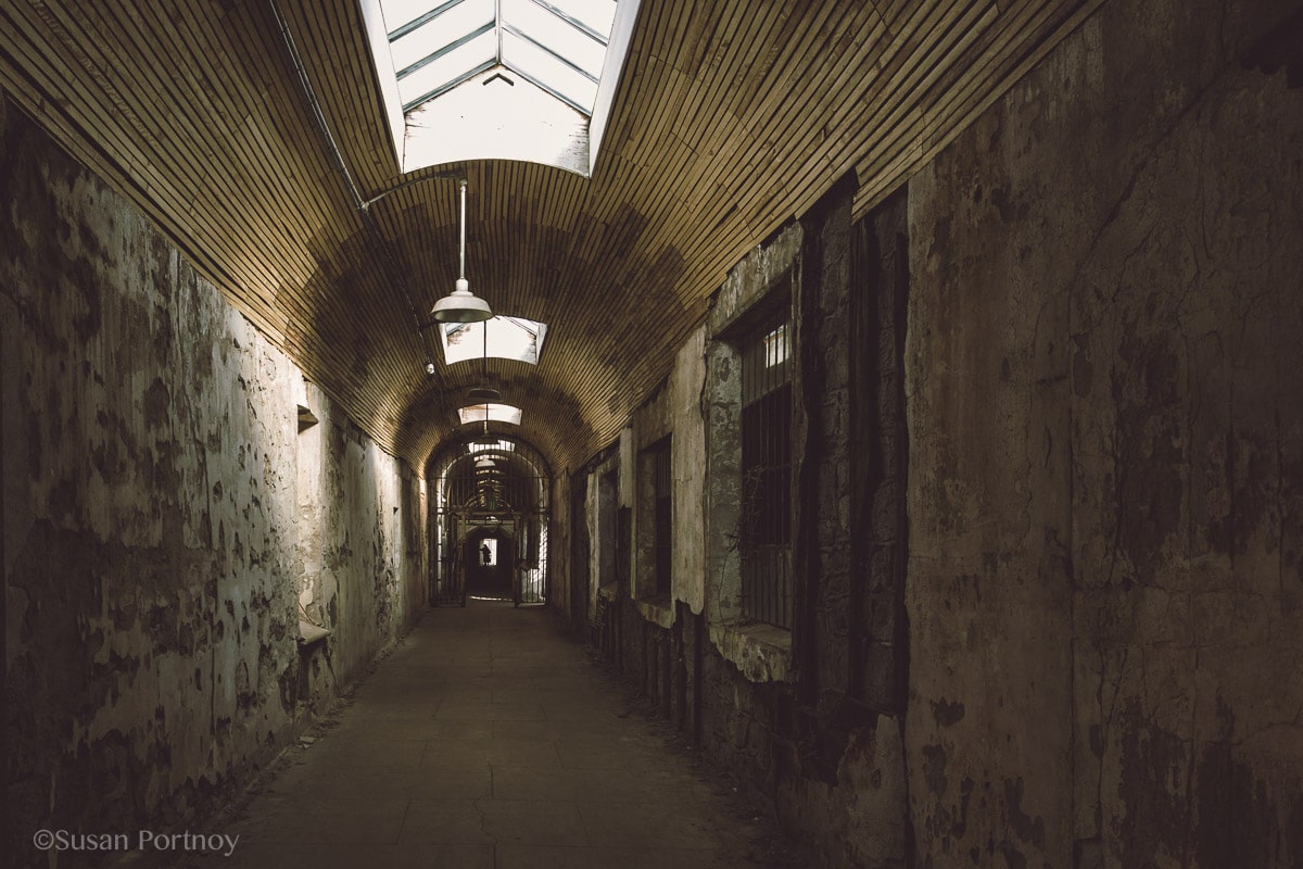 View past the gate of cellblock 2 Eastern State Penitentiary